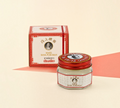 Thai Ranee White Siang Pure Balm in a 40g glass jar with a red lid next to its matching decorative product box.