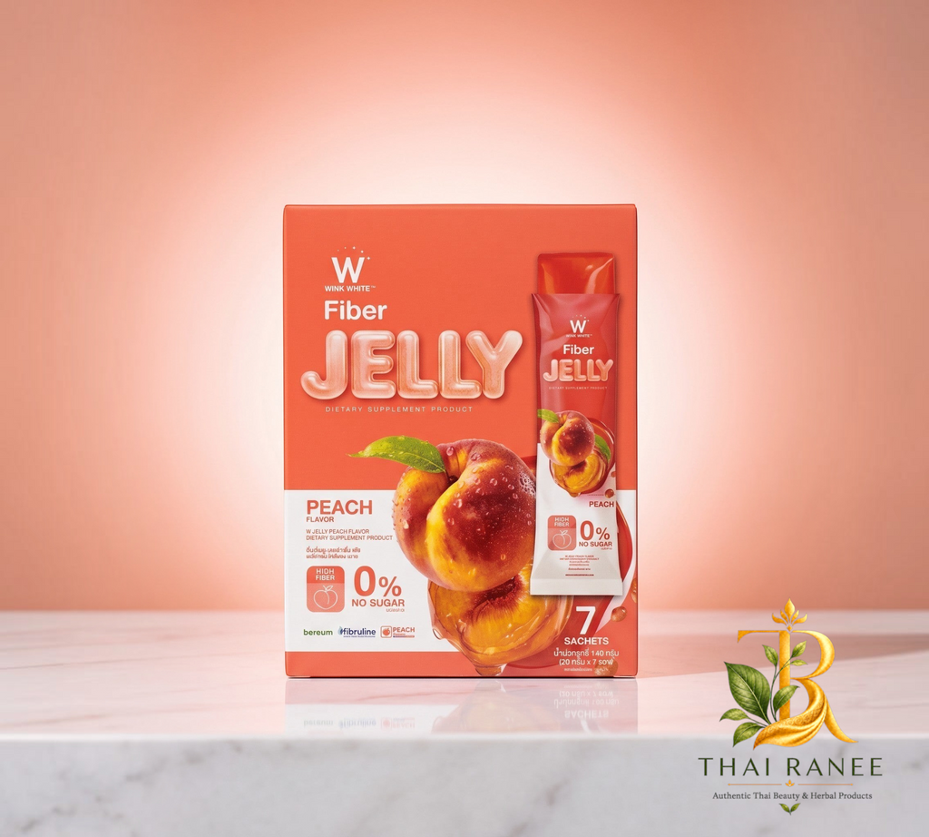 Thai Ranee WINK WHITE peach fiber jelly supplement box and sachet on a marble surface with a soft peach background.